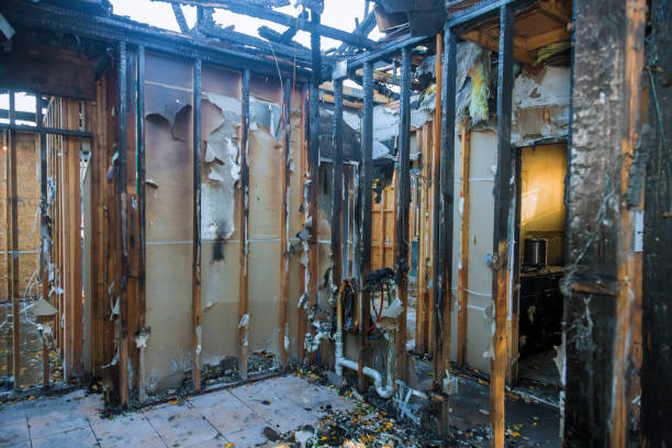 Professional Fire Damage Restoration technician working in Bellmawr, NJ